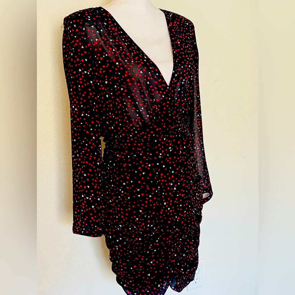 Dress with red and white hearts .